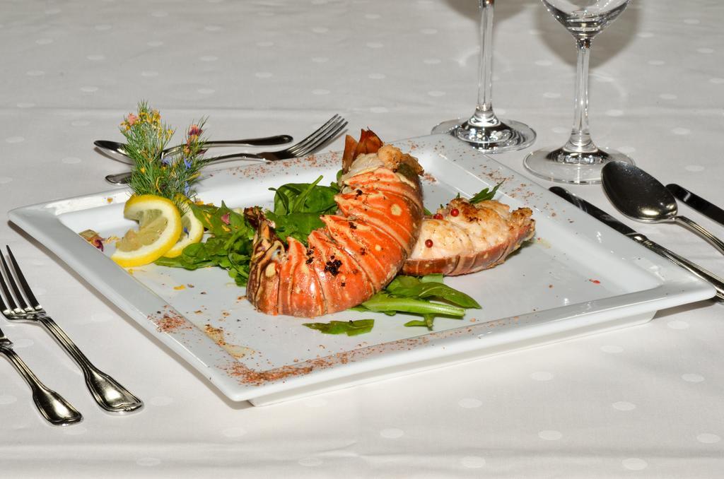 Hotel Restaurant Ferienwohnungen Alpenhof Übersee Esterno foto